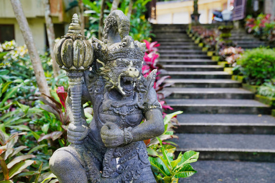 Ancient monkey warrior statue at Pura Gunung Kawi Sebatu Temple Bali, Indonesia