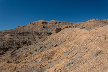 Fototapeta na wymiar Arid slope of rocks in the desert, American southwest Chihuahuan desert, horizontal aspect