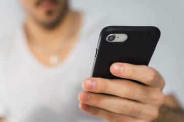 young man using mobile phone