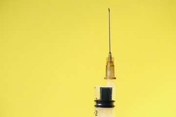 Syringe with a chip. The concept of the theory of conspiracy and implantation of vaccinated chips....