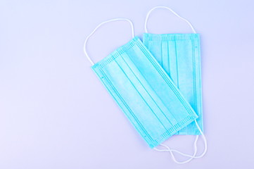 Blue Medical Disposable breath filter Face Mask with covid-19 with earloop. Covid-19 - Wuhan Novel Coronavirus pneumonia COVID-19. Surgical protective antiviral mask. Medical respiratory bandage face.