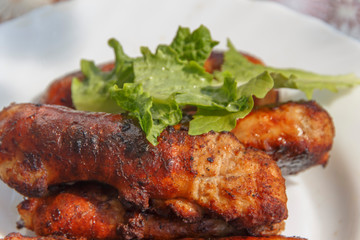 cooked on fire small sausages close-up  