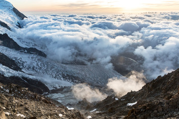 Dramatic sunset sky over the Rogues Alps. View from the Cosmique refuge, Chamonix, France. Perfect moment in alpine highlands.