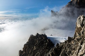 Clouds and fog near Aiguille du Midi. View from the Cosmique refuge, Chamonix, France. Perfect...