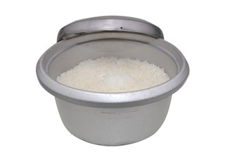 Rice steamed in the cooker isolated on white background