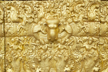 Sculpture on the wall of temple in Thailand.