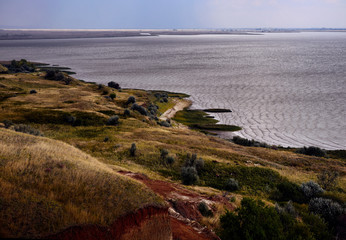 hill by the sea, before the storm