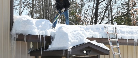 Shoveling Snow on the Roof