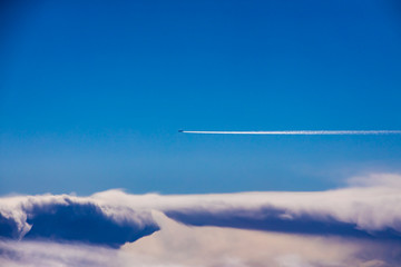 airplane in the sky above cloud