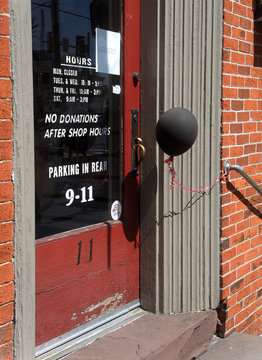 A black balloon outside a closed business during the Covid-19 outbreak