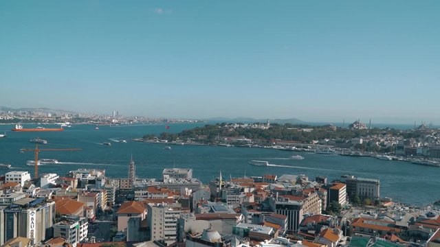 ISTANBUL, TURKEY, May 23rd 2018: Aerial view of Istanbul City from Galata Tower, Galata Bridge and Golden Horn on a beautiful Istanbul day. 4k video.