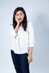 Asian women suffer from severe toothache. Teeth decay, teeth sensitivity and dental clinic