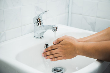 Close up Male hands washing hands with soap. for corona virus prevention.