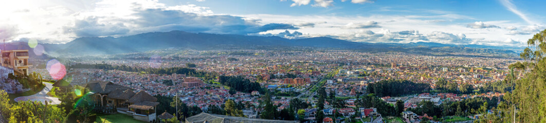 Fototapeta na wymiar Panoramic view of the city of Cuenca, Ecuador, close to sunset, from an observation point. 