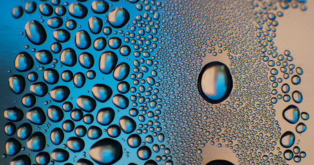 Water drops on the glass, macro water drops, water spray close-up shot, raindrops