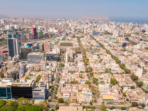 Panoramic aerial drone view of the buildings of Lima city at lockdown on coronavirus pandemic in 2020, in Peru.