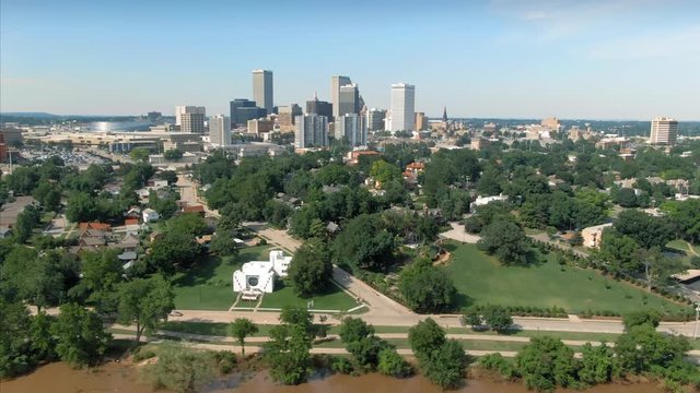 Tulsa, Oklahoma, USA. Aerial of over suburbs & the city skyline.