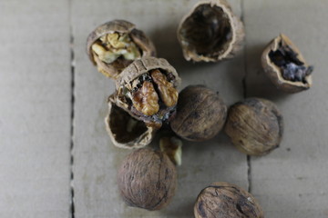 Walnuts on a wooden table.