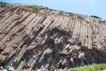 Huge hexagonal columnar joints of volcanic rock at Hong Kong Global Geopark, China 