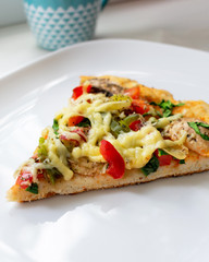 pizza triangle with cheese and mushrooms