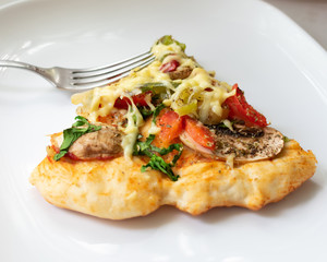 pizza triangle with a silver fork
