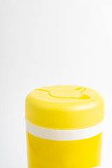 Closed Yellow Top Cap Of A Disinfectant Wipes Container