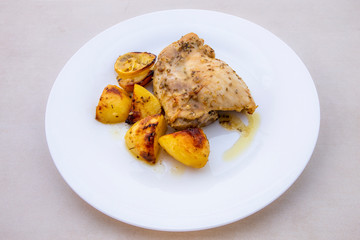 Oven baked greek lemon chicken and potatoes