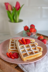home made sweet Belgian waffles with strawberries
