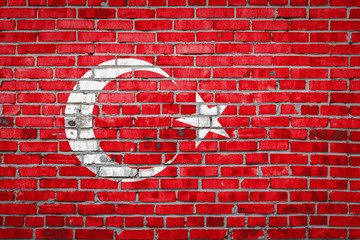 Flag  banner on brick wall background.