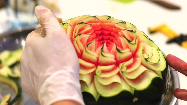 Carving watermelon into beautiful flowers, Thailand style, Thai culture, Thai tradition.