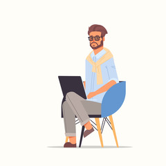 businessman using laptop business man working on notebook male cartoon character sitting on chair full length vector illustration