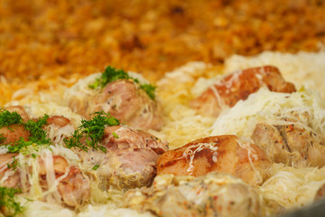 Many pork knuckle in big pot.