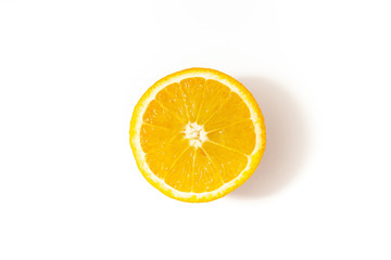 Half cut orange on a white background top view