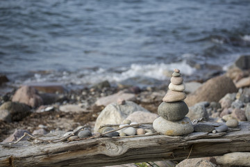 Stone Cairn Balance Art On Baltic Sea Coast