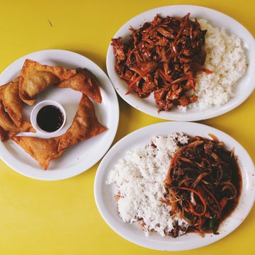 Korean Beef And Chicken Bulgogi Served On Plate