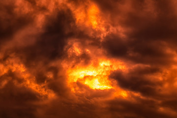 Fototapeta premium dramatic dark sky with red and orange light