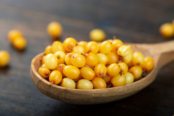 sea buckthorn in a spoon