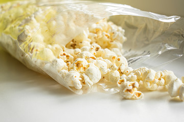 Open cellophane packaging with popcorn