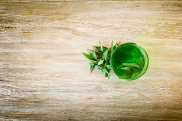 Fresh Andrographis paniculata ice tea on a wooden table, Fresh Andrographis paniculata ice tea on a wooden table,Free space