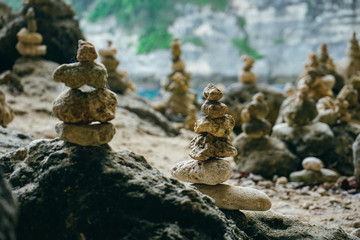 Balancing stones pyramids symbolizing zen, harmony, balance