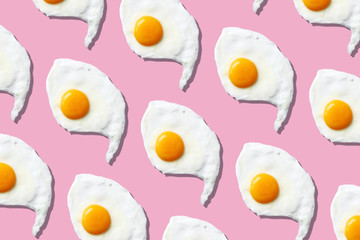 Fried egg or scrambled eggs pattern on pink background. Creative food concept. Top view. Conceptual trend. Banner. Keto diet. Healthy food print. Creative design for packaging.