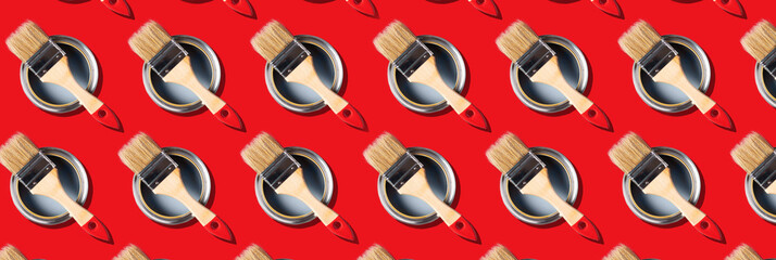 Brush and open paint can pattern on red background. Top view, copy space. Creative design for packaging. Appartment renovation, repair, building and home design concept.