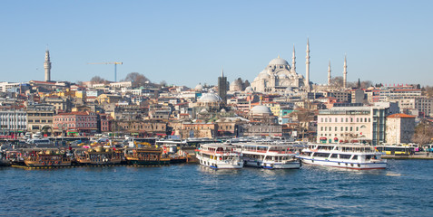 Obraz premium Istanbul, Turkey - home of many Istanbul landmarks, like Hagia Sofia, the Topkapi Palace, the Blue Mosque, the Fatih district is the core of the city. Here in particular the Golden Horn