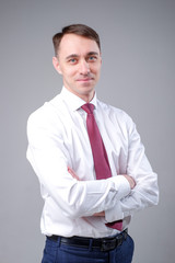 man in a business suit on a plain background
