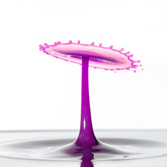 Beautiful abstract unique water drop splash photography images with vibrant colorful water collisions captured using high speed flash technique