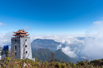 landscape view at Fansipan peak mountain, there are temple and buddha statue on the top famous place for travel in Sapa city, Vietnam.