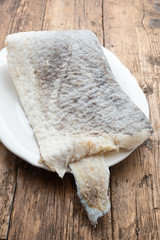 Slice of raw salted codfish