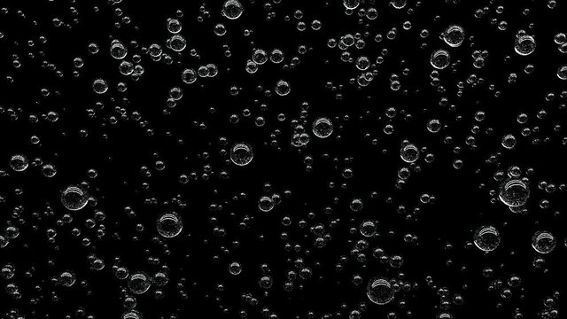 Gas is lighter than water. White gas bubbles on a black background confirm the rule.