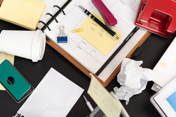 Messy and cluttered desk