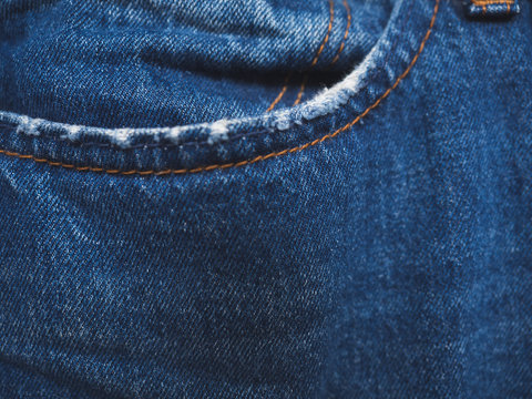 Bolsillo pantalones vaqueros, azules y con textura.